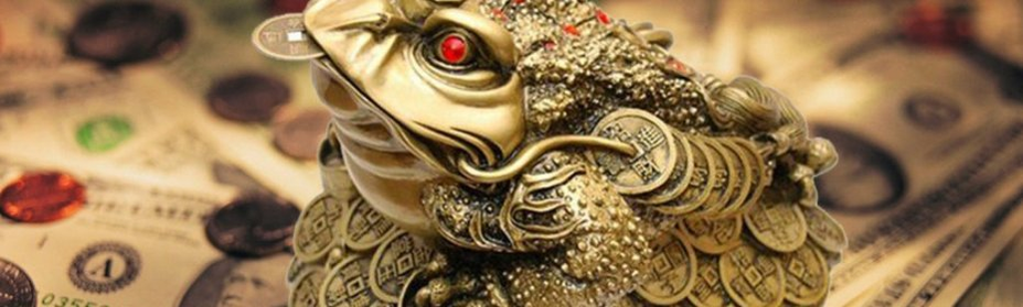 Toad le bonn sa bhéal - Talisman chun airgead a mhealladh